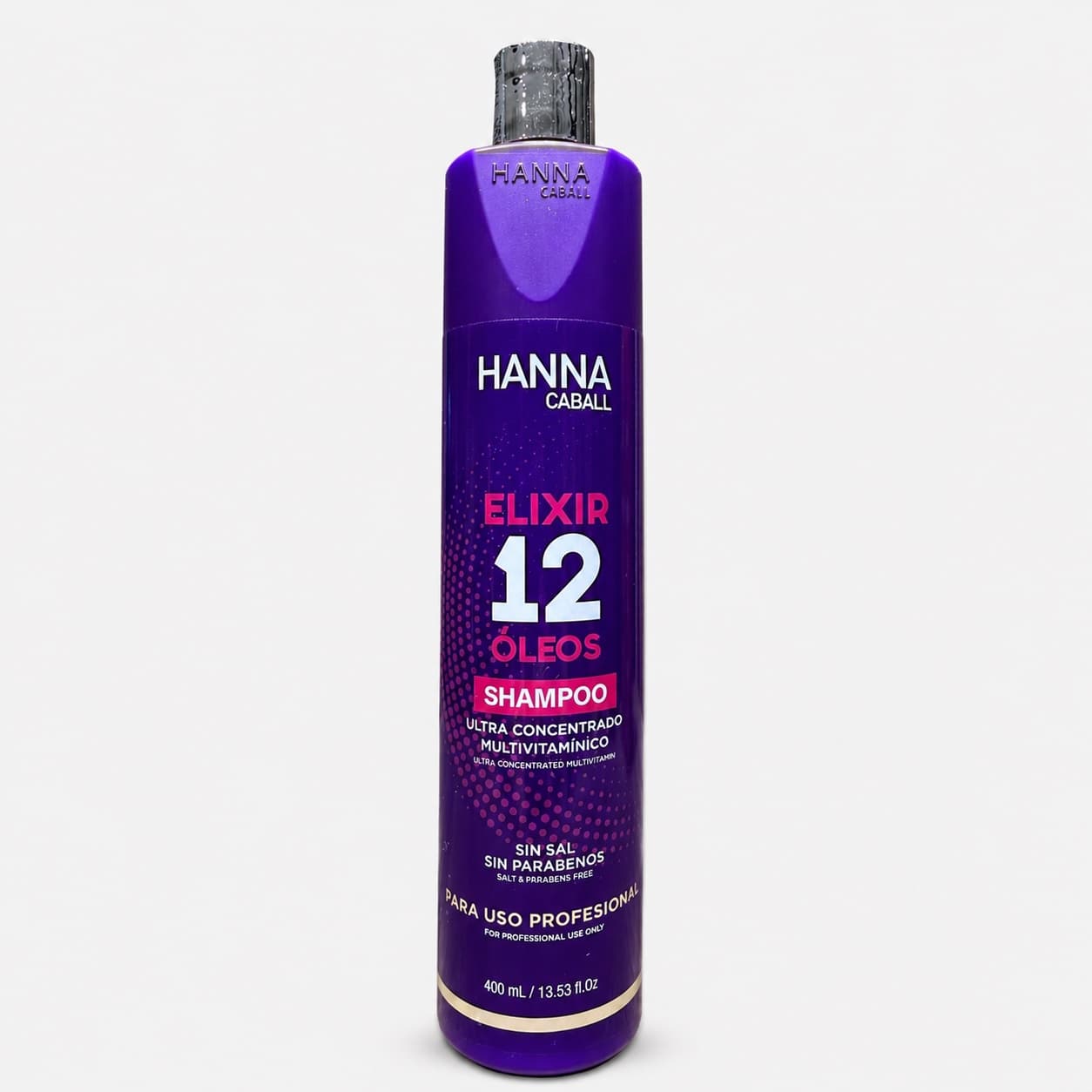 Botella morada de Hanna Caball Elixir 12 Óleos Shampoo de 400 ml