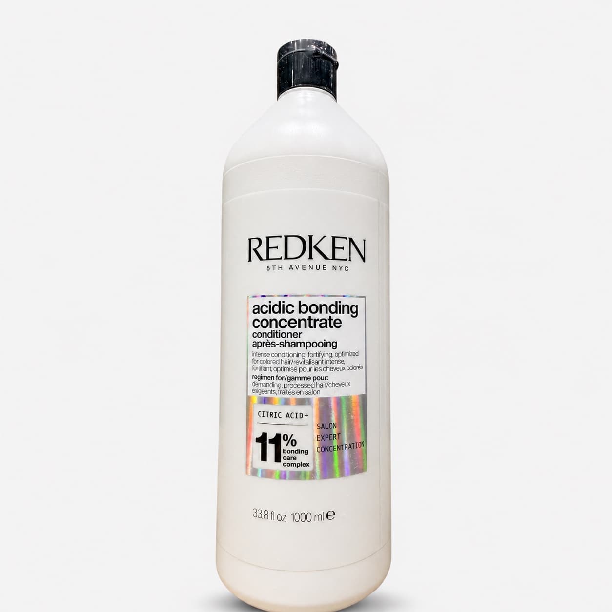 Botella blanca de Redken Acidic Bonding Concentrate Conditioner de 1000 ml